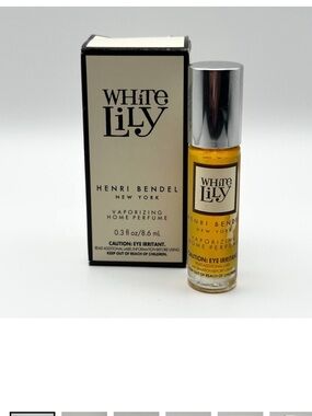 Henri Bendel White Lily Roller Bottle in Amber and Silver Vintage